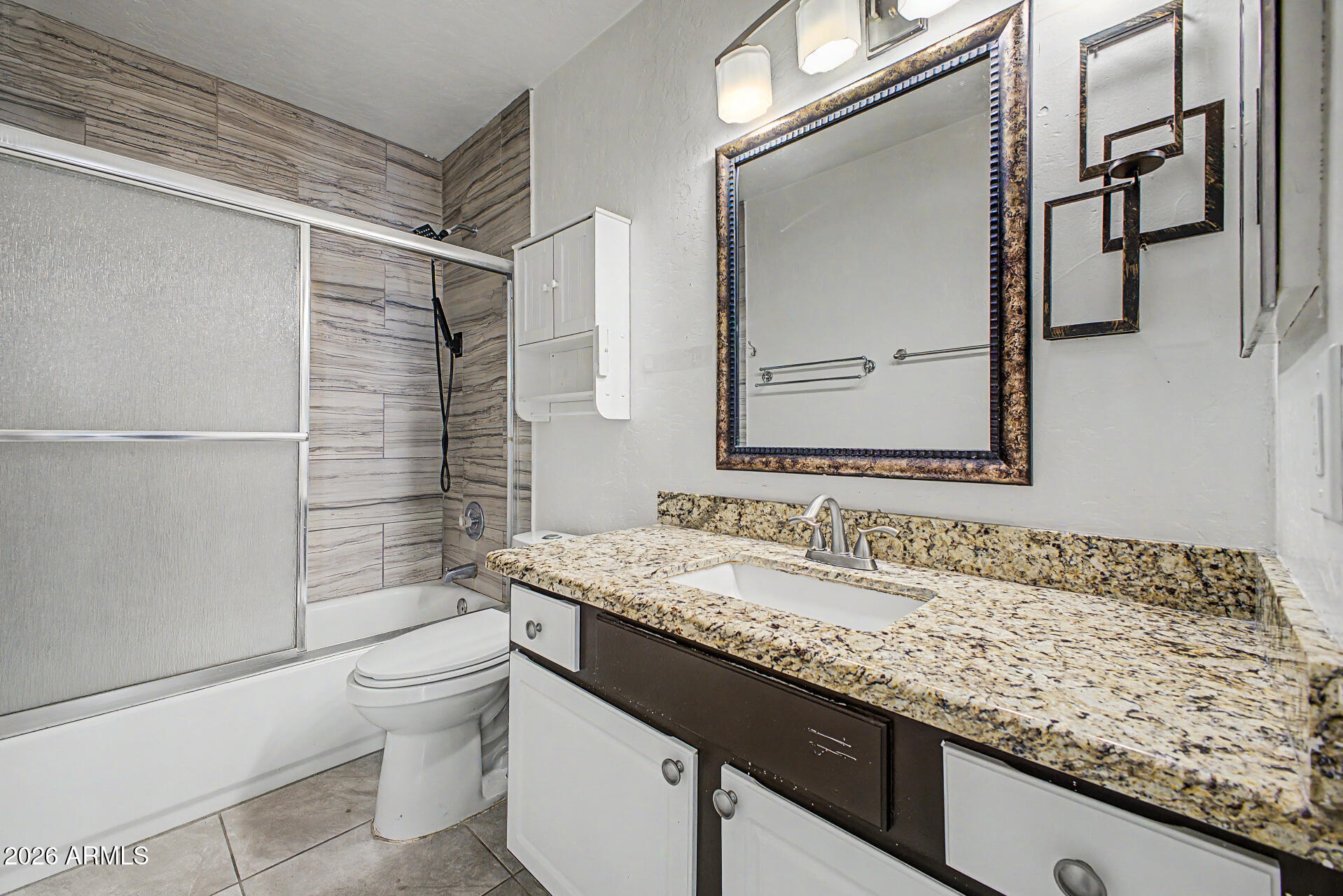 156 North Nielson Street Gilbert, AZ 85234 - Photo 21 of 32 a bathroom with a granite countertop sink toilet and shower