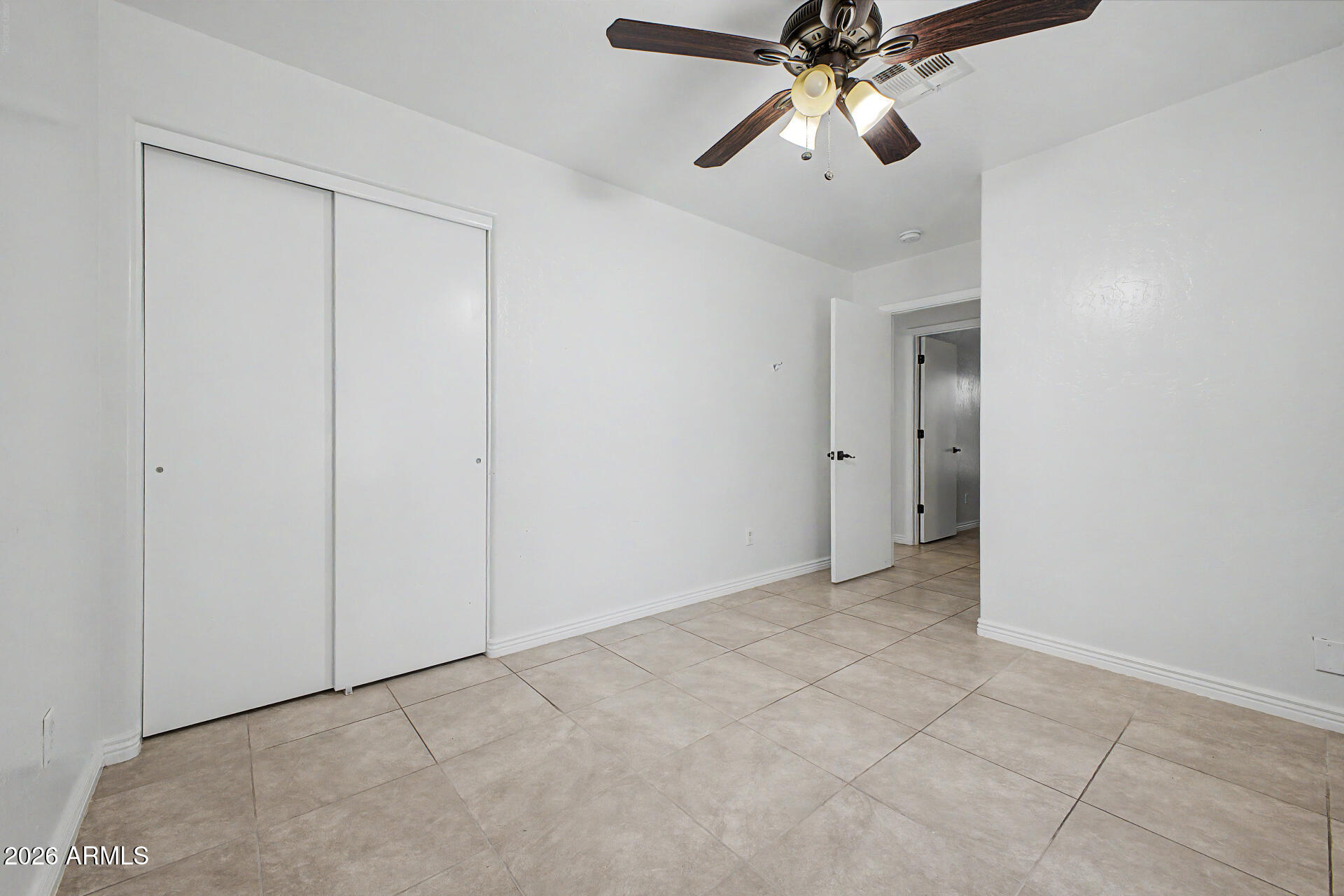 156 North Nielson Street Gilbert, AZ 85234 - Photo 25 of 32 an empty room with chandelier fan