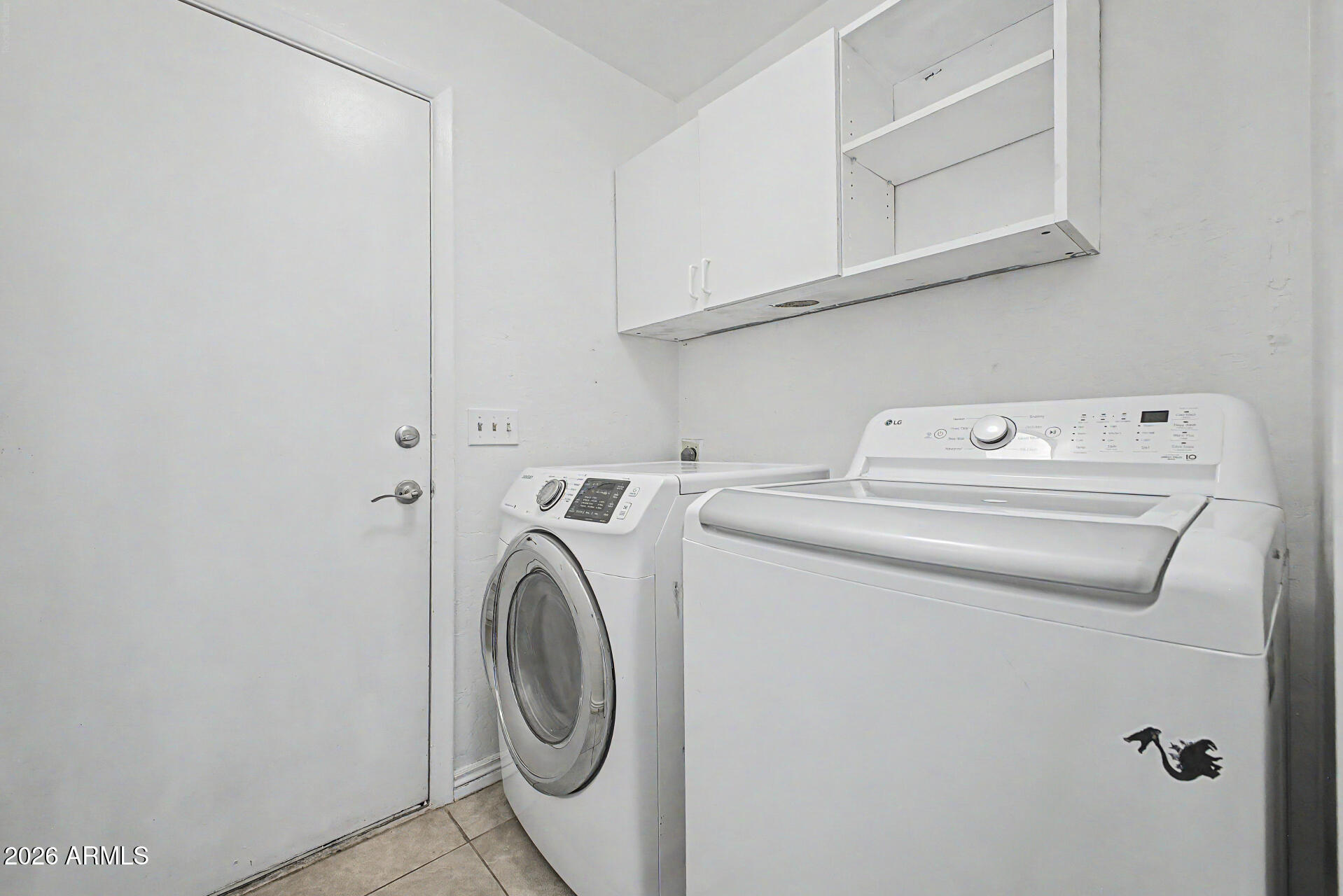 156 North Nielson Street Gilbert, AZ 85234 - Photo 26 of 32 a utility room with dryer and washer