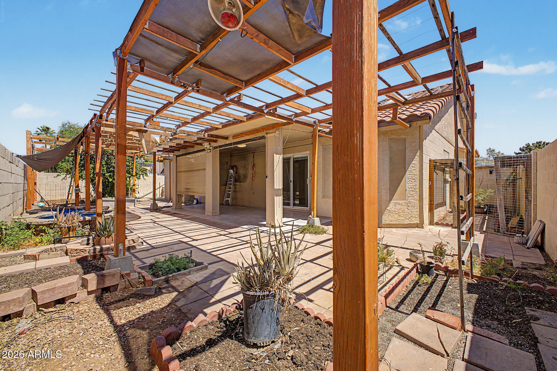 156 North Nielson Street Gilbert, AZ 85234 - Photo 29 of 32 a view of a house with backyard and sitting area