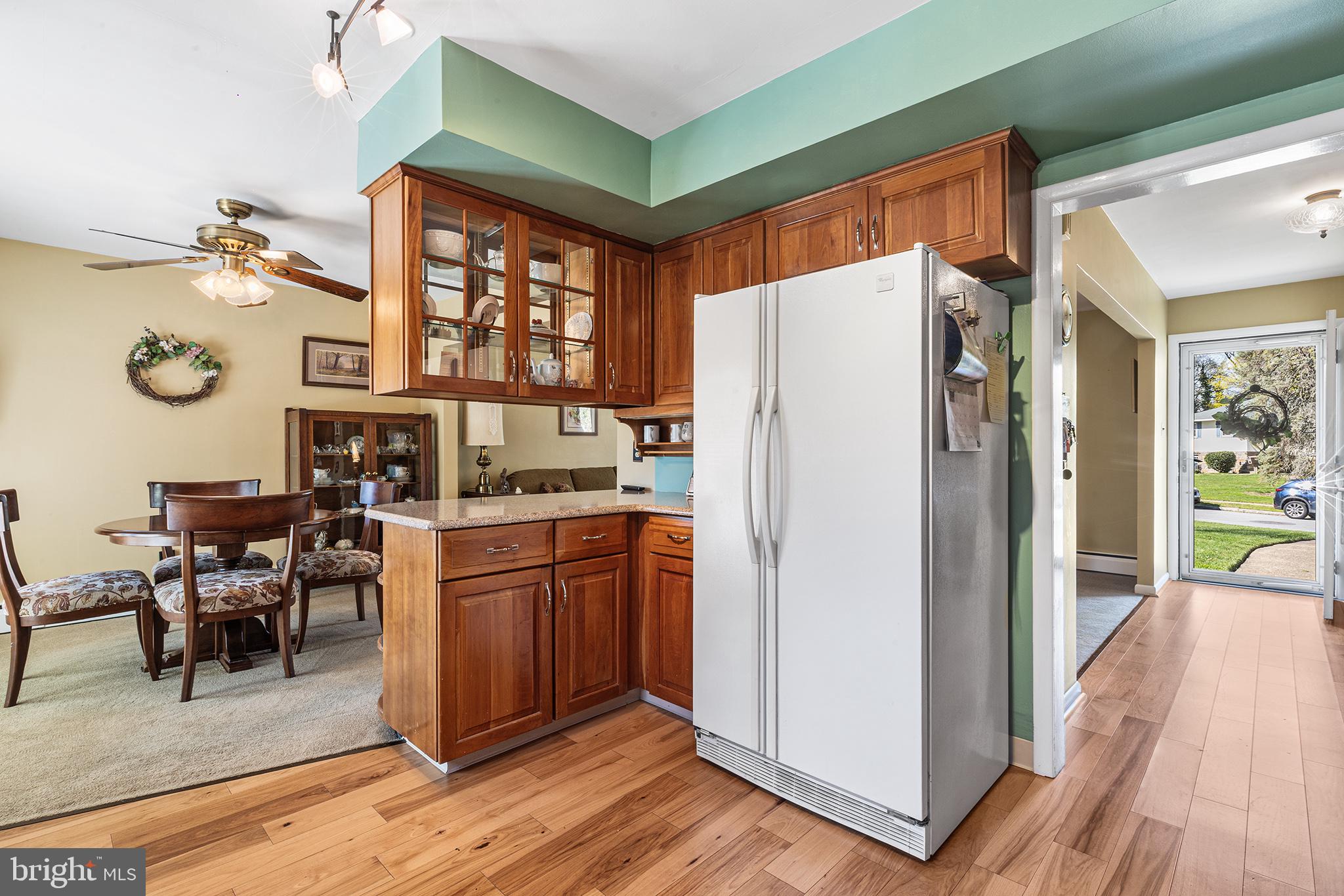 331 North Lehigh Circle Swarthmore, PA 19081 - Photo 13 of 32 a kitchen with stainless steel appliances granite countertop a refrigerator and a stove top oven