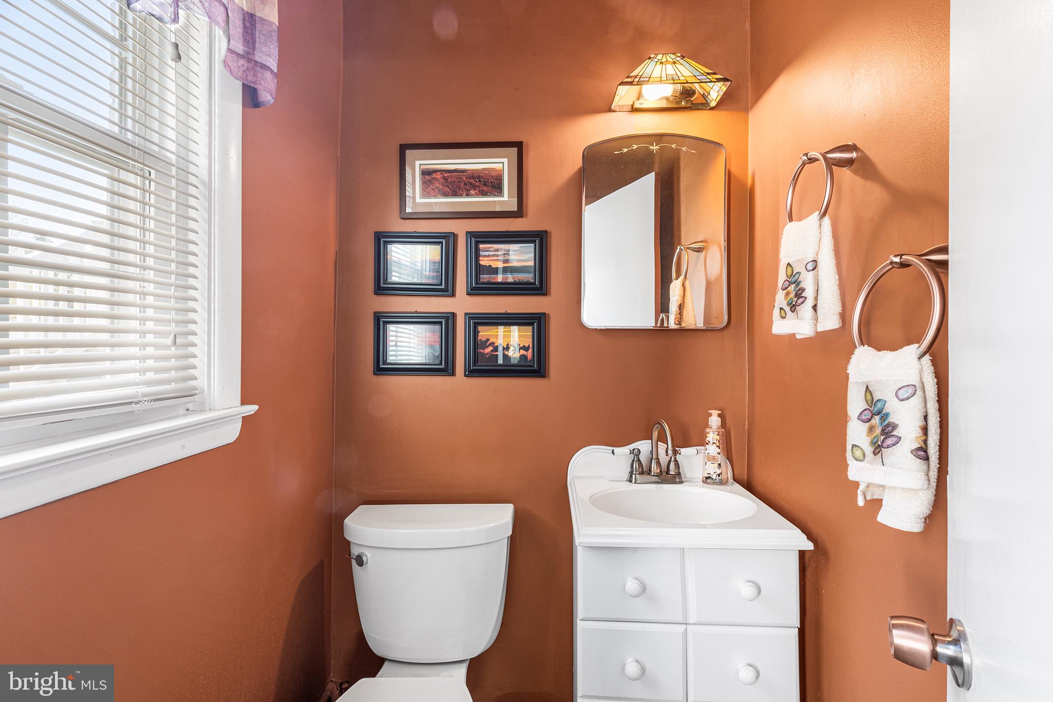 331 North Lehigh Circle Swarthmore, PA 19081 - Photo 16 of 32 a bathroom with a toilet sink and mirror