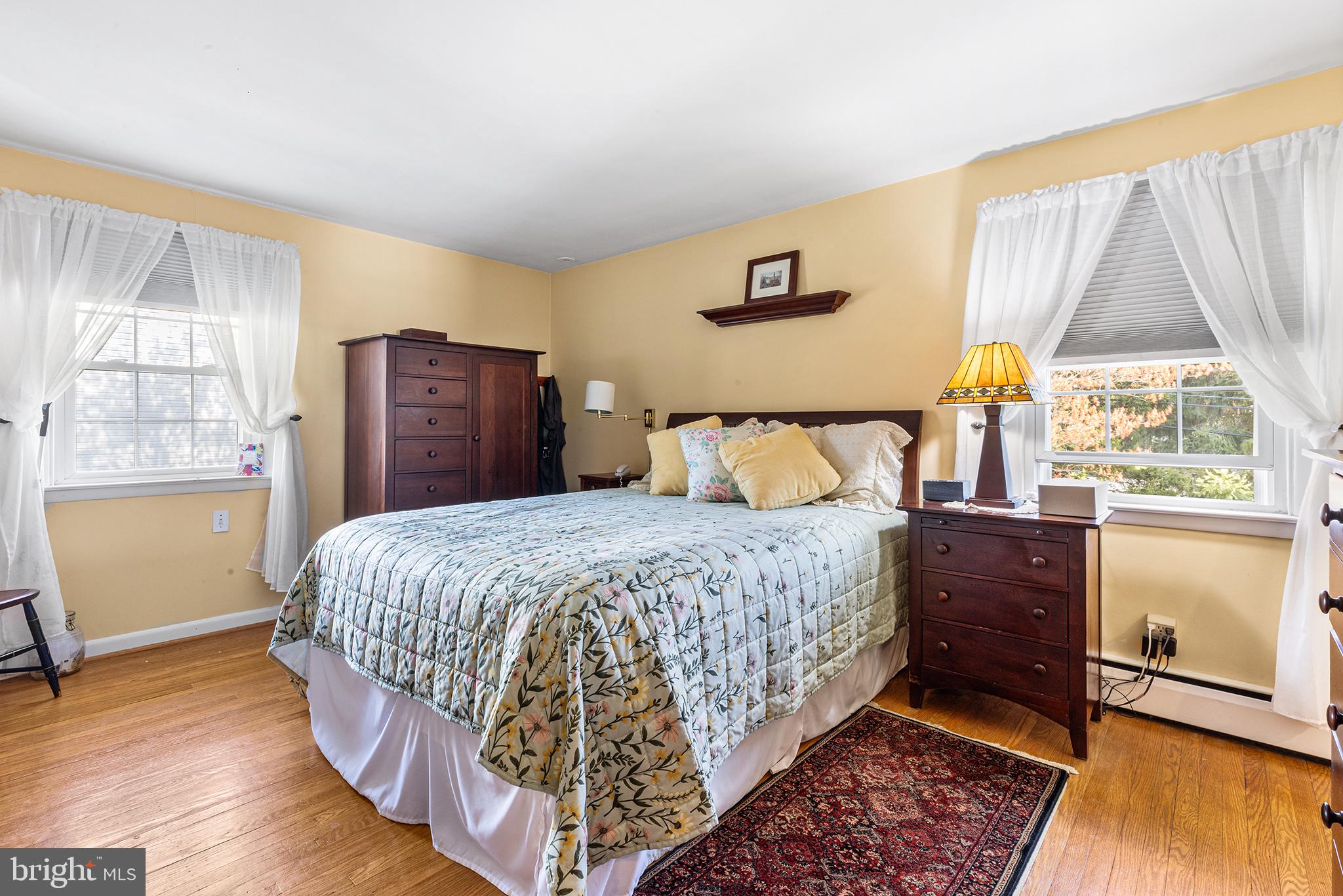 331 North Lehigh Circle Swarthmore, PA 19081 - Photo 19 of 32 a bedroom with a bed and a window