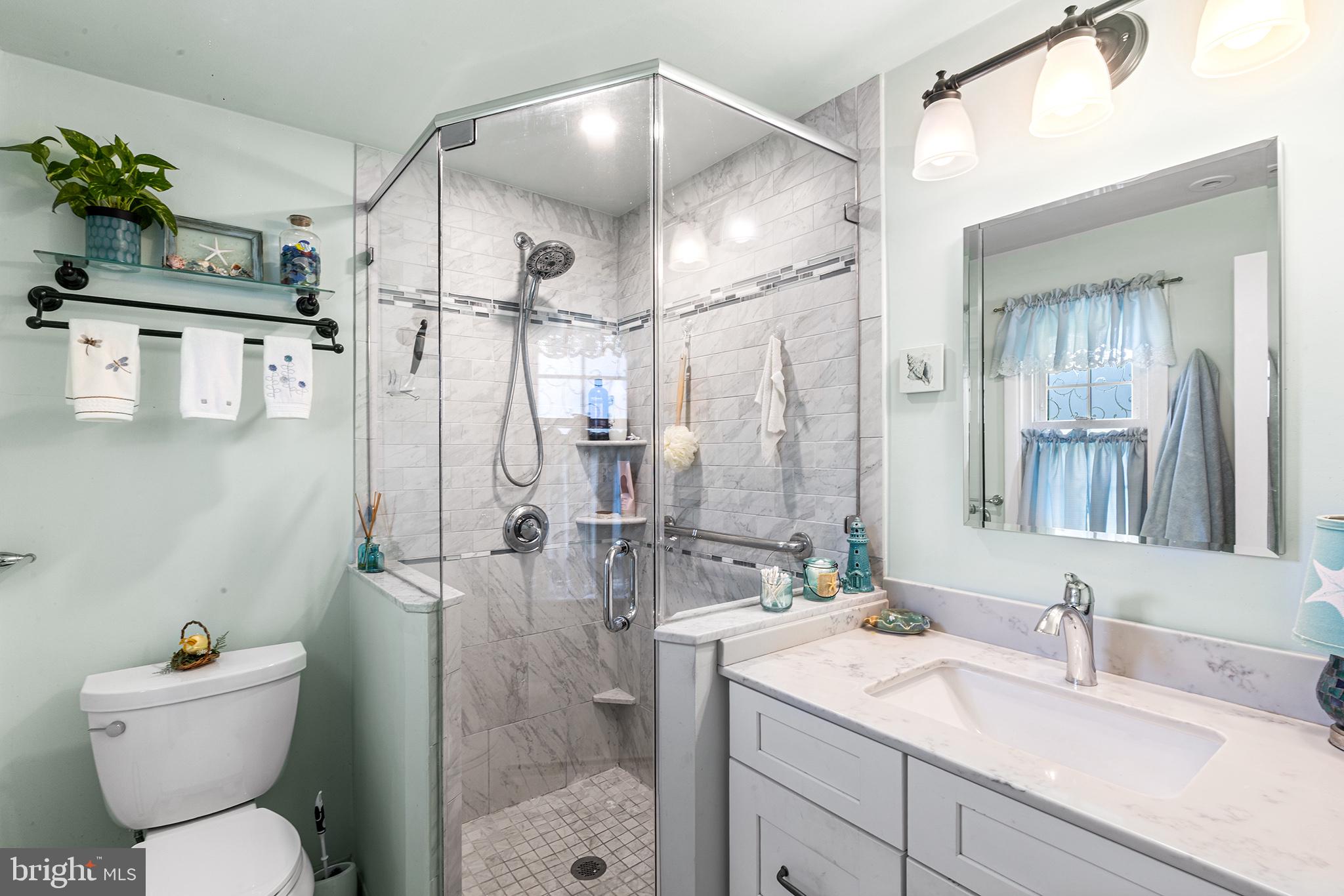 331 North Lehigh Circle Swarthmore, PA 19081 - Photo 22 of 32 a bathroom with a sink toilet and shower