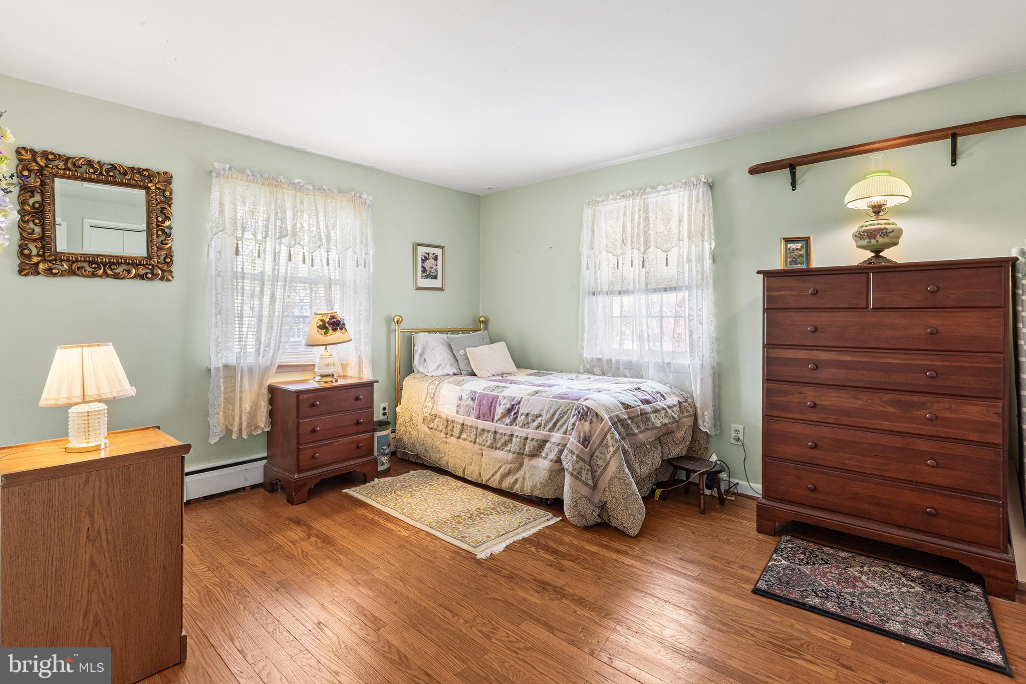 331 North Lehigh Circle Swarthmore, PA 19081 - Photo 23 of 32 a bedroom with a bed and a dresser
