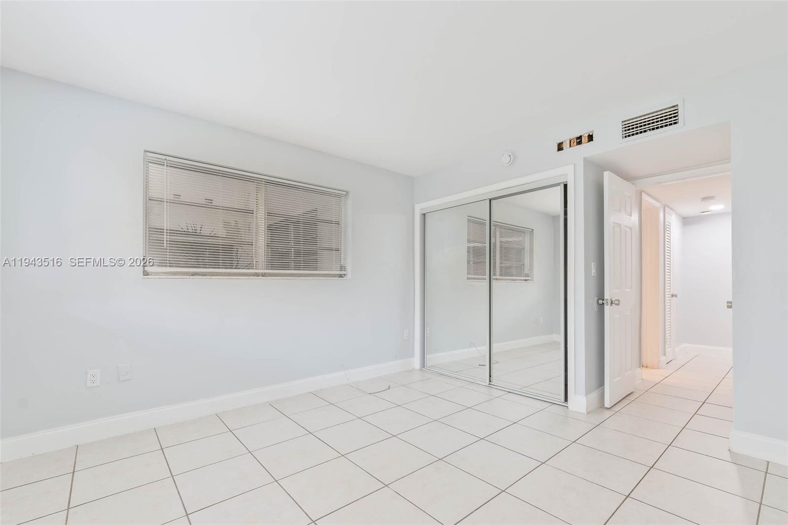 7324 Southwest 82nd Street, Unit B108 Miami, FL 33143 - Photo 14 of 17 a view of an empty room