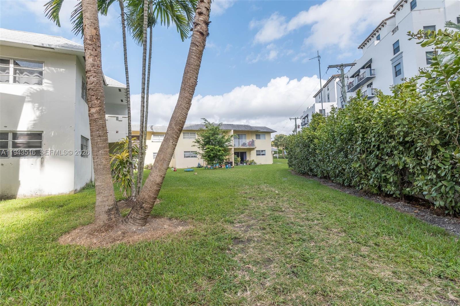 7324 Southwest 82nd Street, Unit B108 Miami, FL 33143 - Photo 16 of 17 a view of a garden