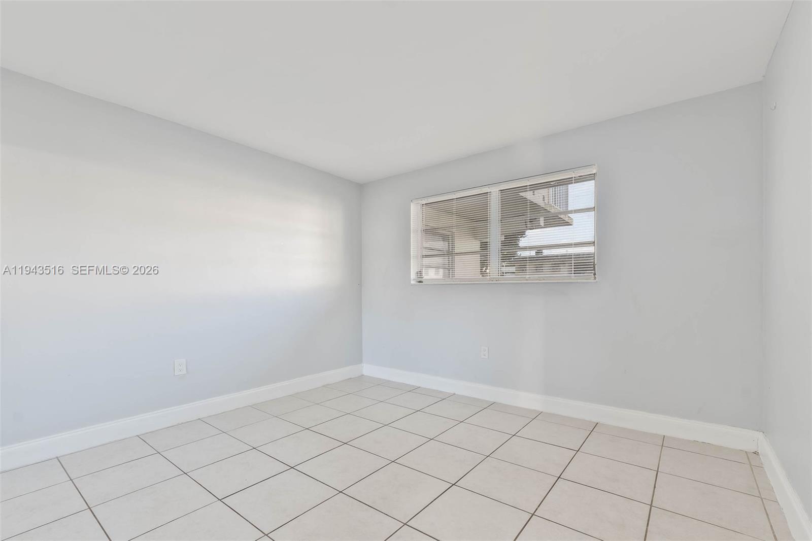 7324 Southwest 82nd Street, Unit B108 Miami, FL 33143 - Photo 9 of 17 a view of an empty room