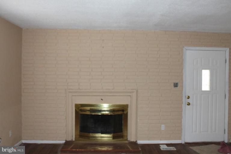9415 Windpine Road, Unit 9415 Middle River, MD 21220 - Photo 4 of 11 a room with a fireplace