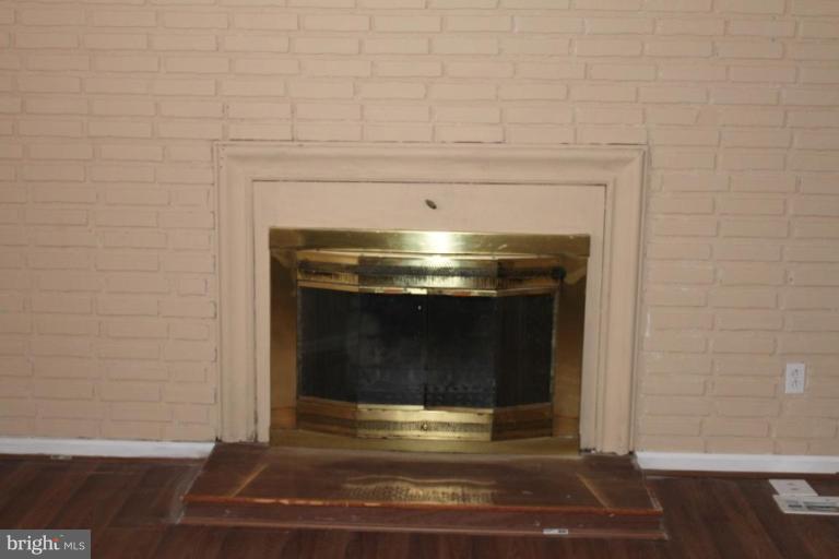 9415 Windpine Road, Unit 9415 Middle River, MD 21220 - Photo 5 of 11 a view of a fireplace