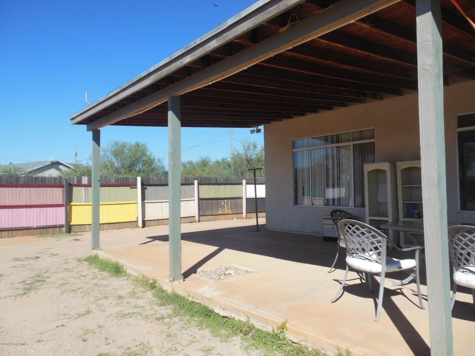 1116 Paseo Espuelas Rio Rico, AZ 85648 - Photo 25 of 26 a patio with a table and chairs