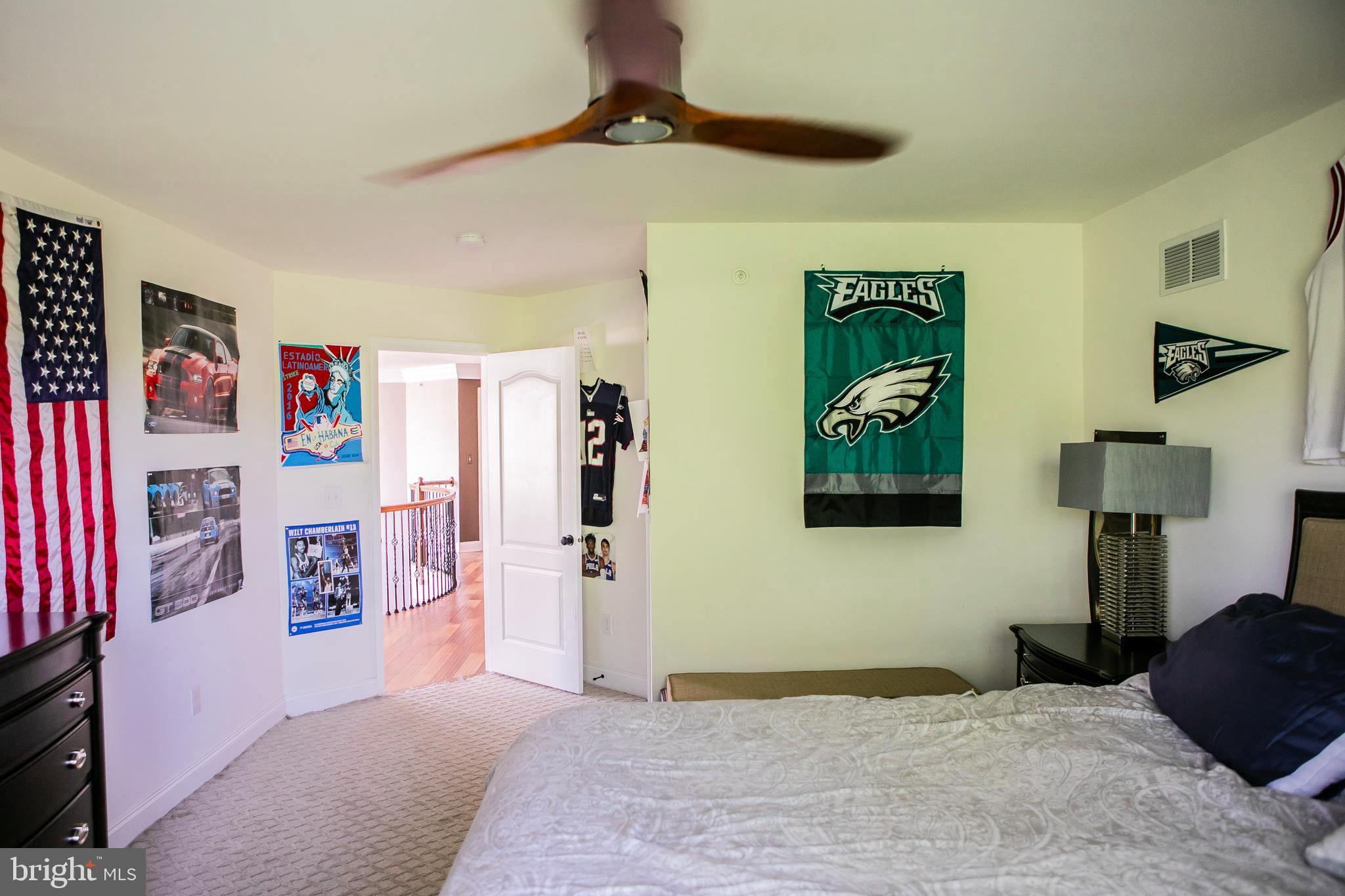 90 Lilac Road Malvern, PA 19355 - Photo 29 of 39 a bedroom with a bed and a walk in closet