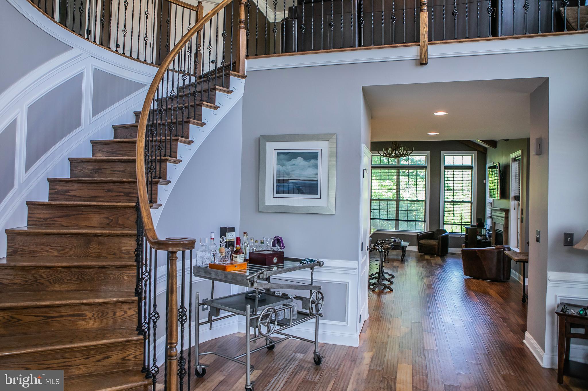 90 Lilac Road Malvern, PA 19355 - Photo 6 of 39 a view of entryway and hall with wooden floor