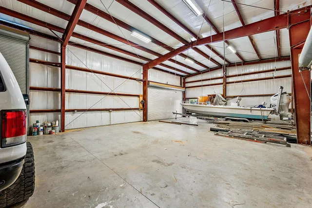 a view of green field with trees