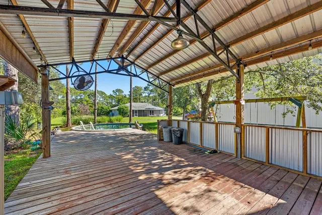 a view of a backyard with a patio