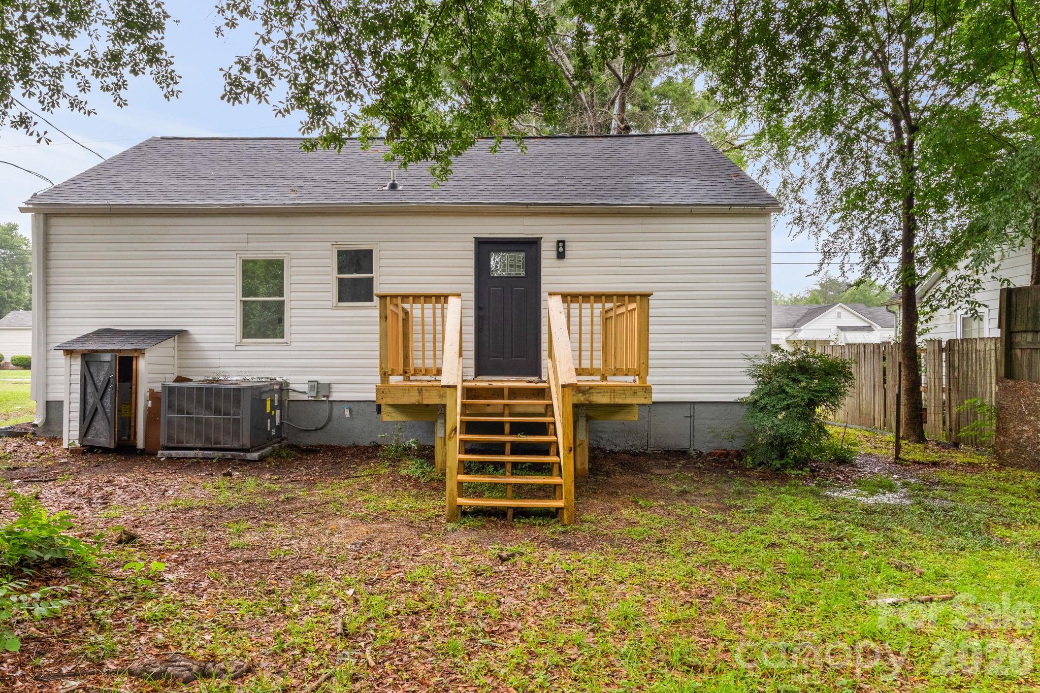 110 Courtland Street Chester, SC 29706 - Photo 20 of 22 a front view of a house with garden