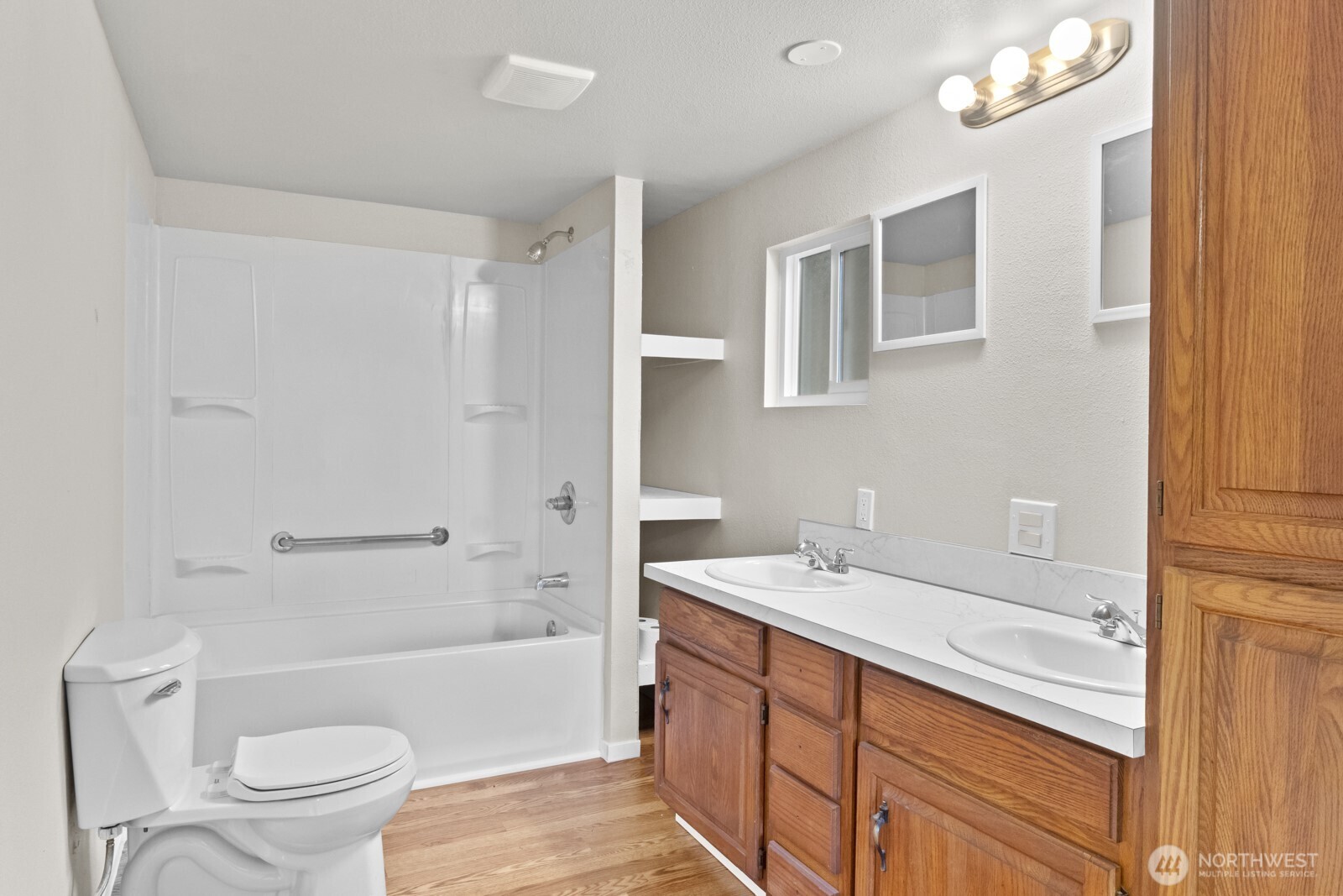 510 Duterrow Road Southeast, Unit 4 Olympia, WA 98513 - Photo 21 of 37 a bathroom with a sink a toilet and a bathtub