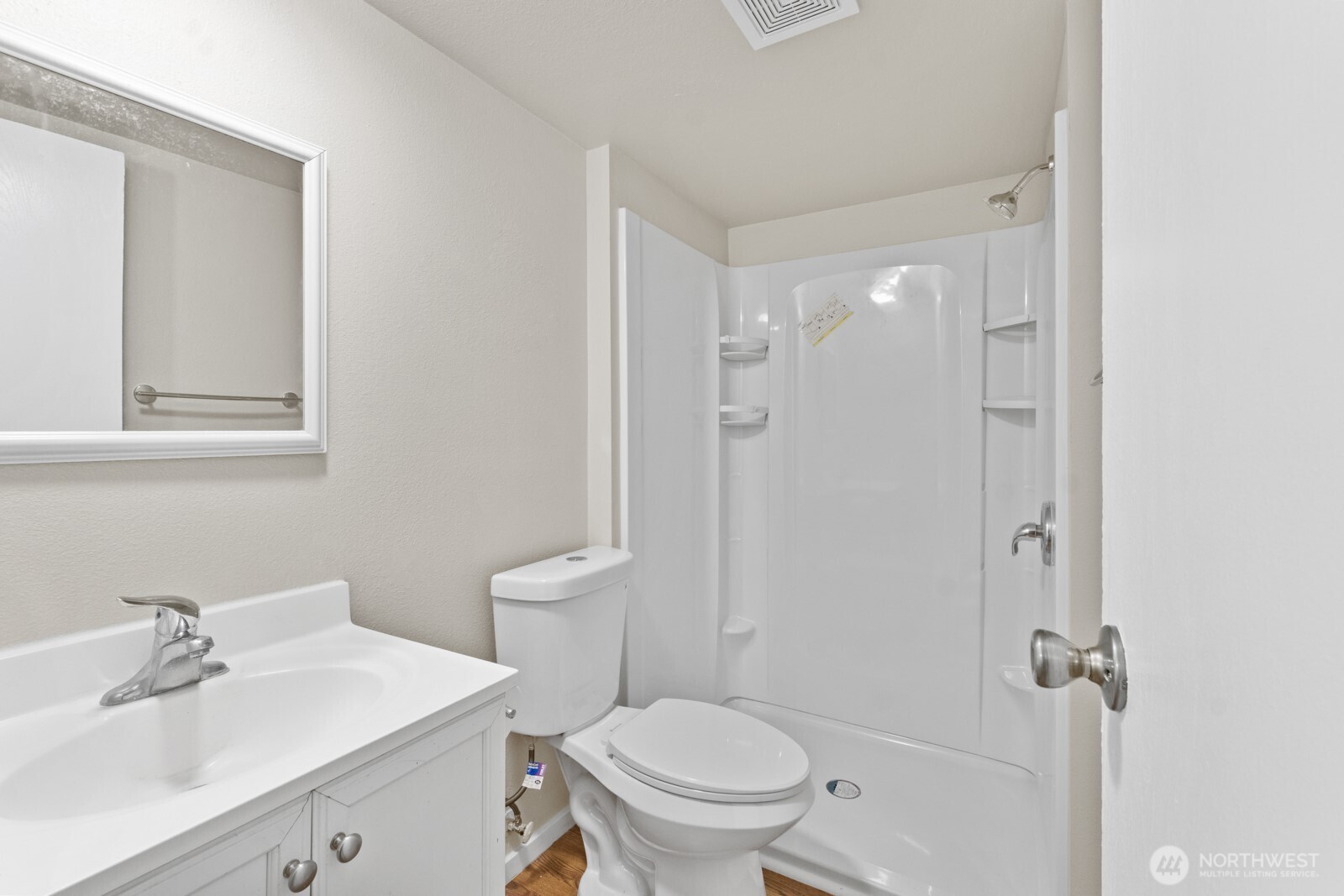 510 Duterrow Road Southeast, Unit 4 Olympia, WA 98513 - Photo 26 of 37 a bathroom with a sink a toilet and shower