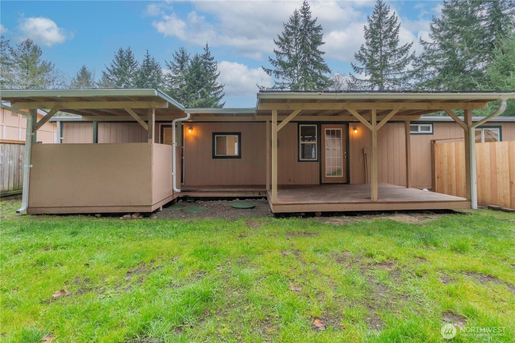 510 Duterrow Road Southeast, Unit 4 Olympia, WA 98513 - Photo 27 of 37 a view of backyard with barbeque grill and iron fence