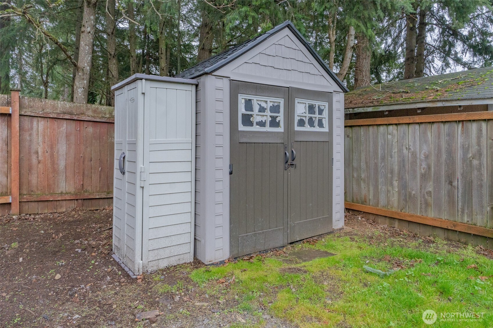 510 Duterrow Road Southeast, Unit 4 Olympia, WA 98513 - Photo 32 of 37 a view of a small house with wooden fence