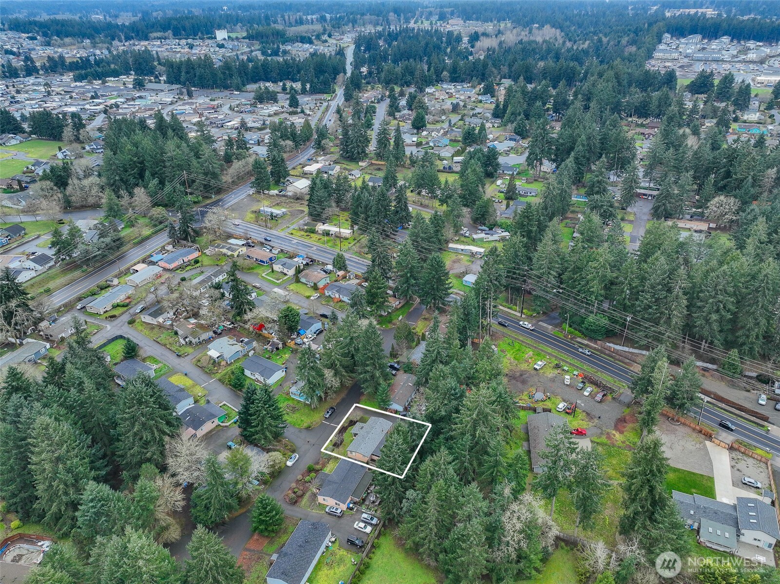 510 Duterrow Road Southeast, Unit 4 Olympia, WA 98513 - Photo 5 of 37 an aerial view of residential houses with outdoor space and trees