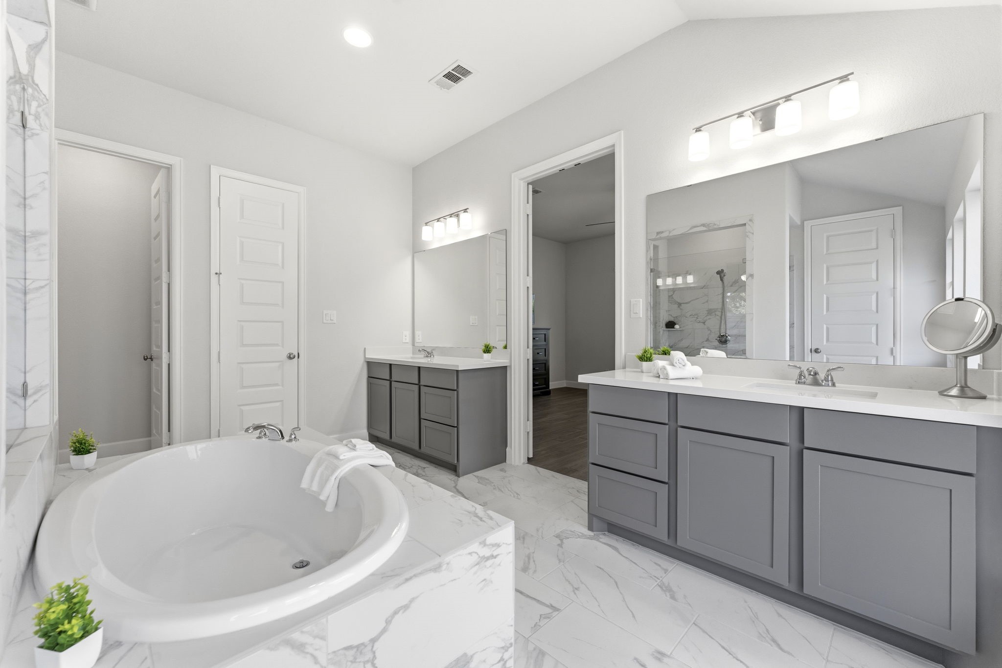 15618 Turtlehead Trail Conroe, TX 77302 - Photo 23 of 50 Primary Ensuite Bath, Neutral Colors, Dual Sink Vanity w/spacious cabinetry! Large Soaking Tub. An Elegant, Relaxing Escape to end your day!