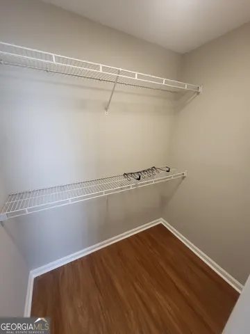 a view of a room with racks on the wall