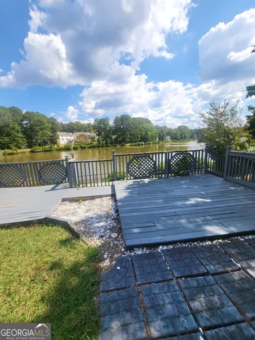 a view of a lake with a garden