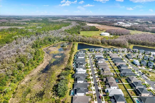 a view of front of a house with a garden