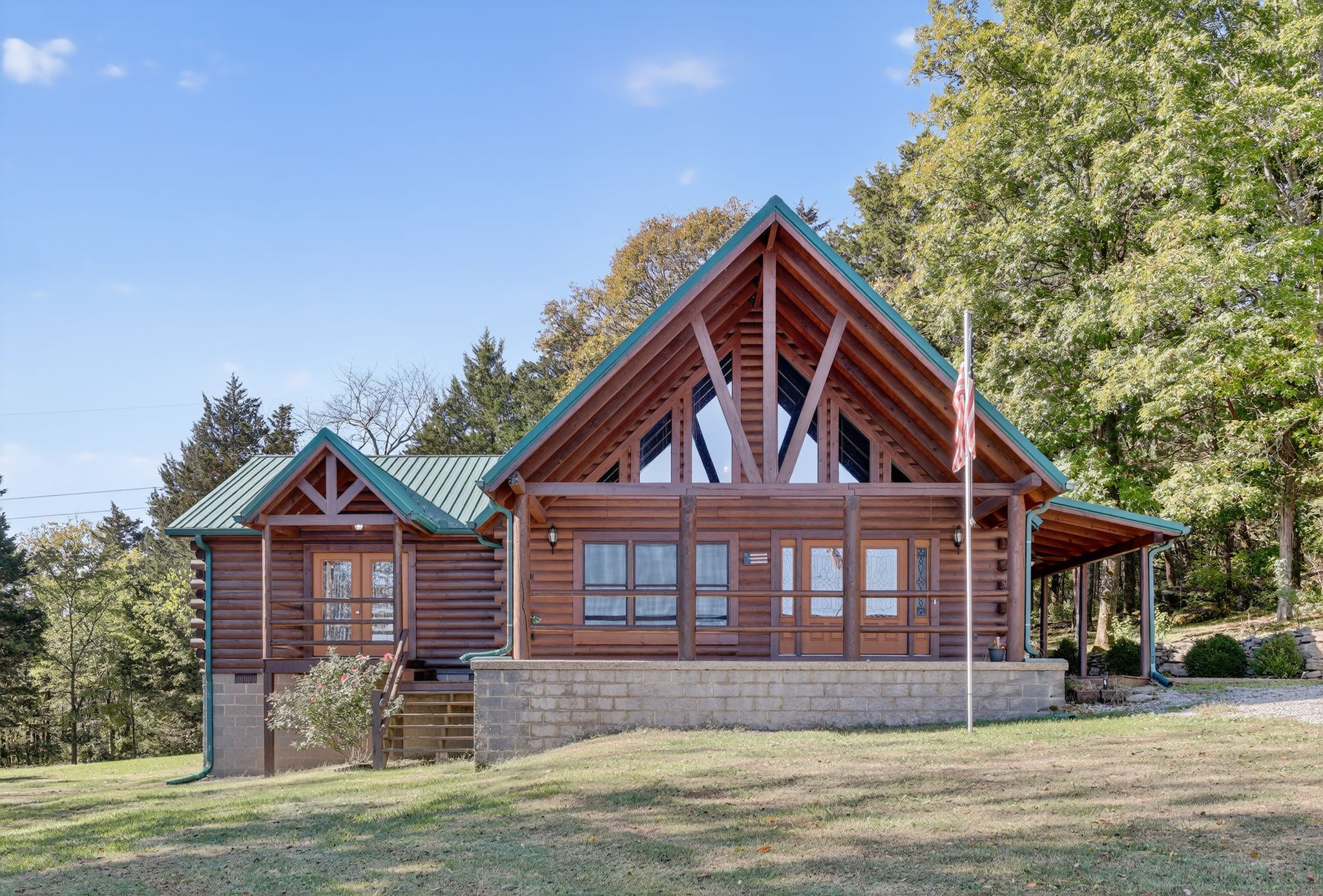 1794 Roberts Road Watertown, TN 37184 - Photo 1 of 38 a front view of a house with a yard and garage