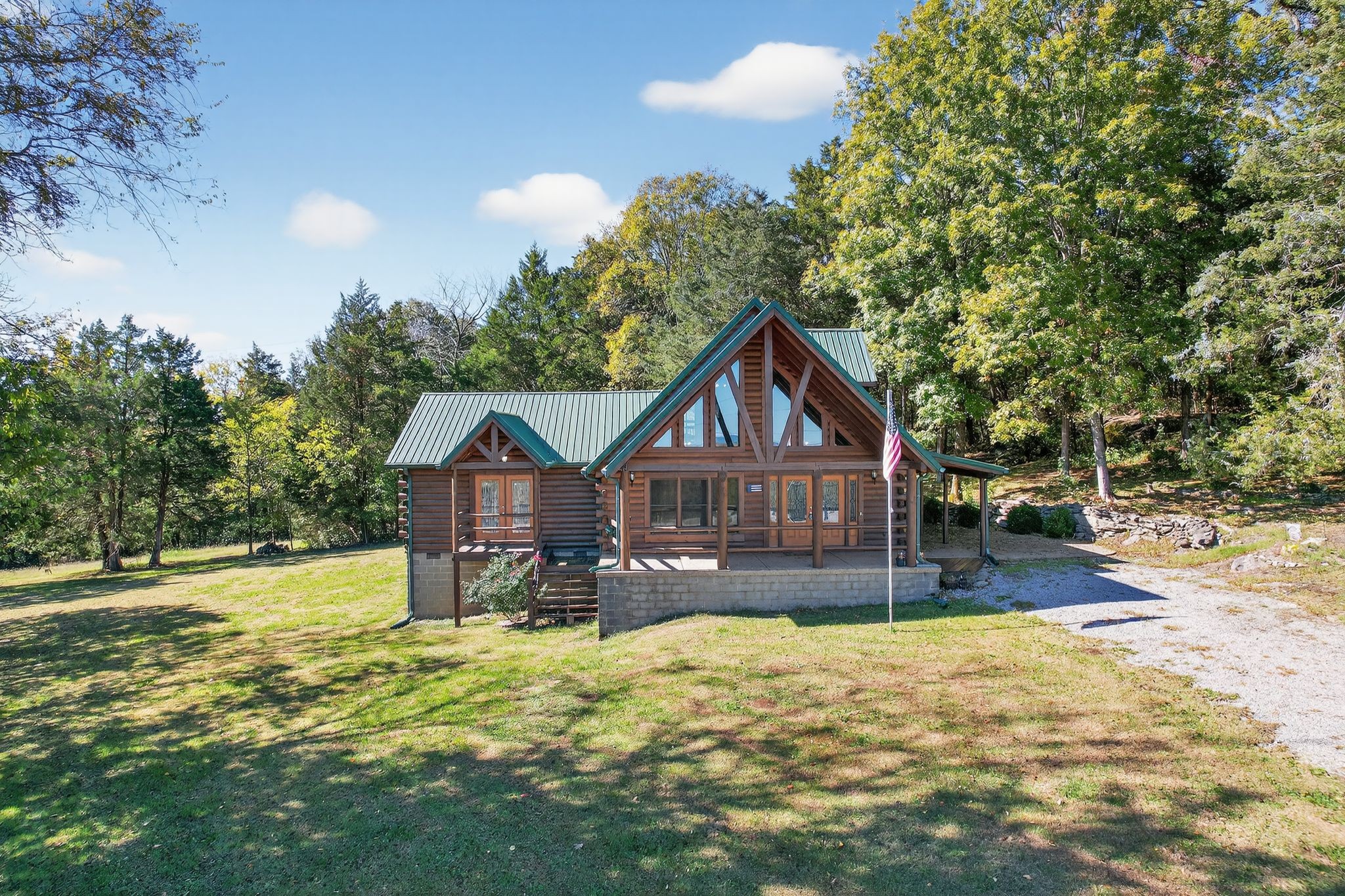 1794 Roberts Road Watertown, TN 37184 - Photo 17 of 38 a front view of a house with a yard