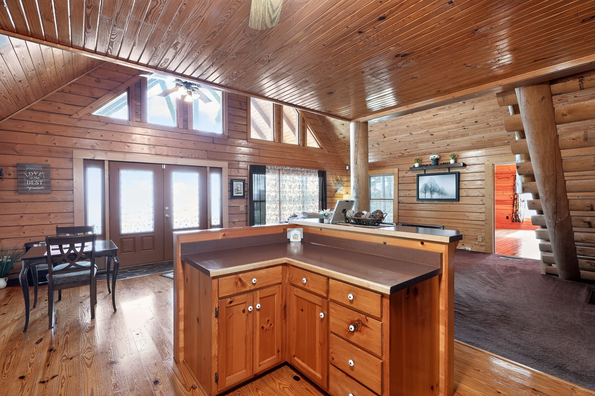 1794 Roberts Road Watertown, TN 37184 - Photo 21 of 38 a kitchen with stainless steel appliances granite countertop a stove and wooden cabinets with wooden floor