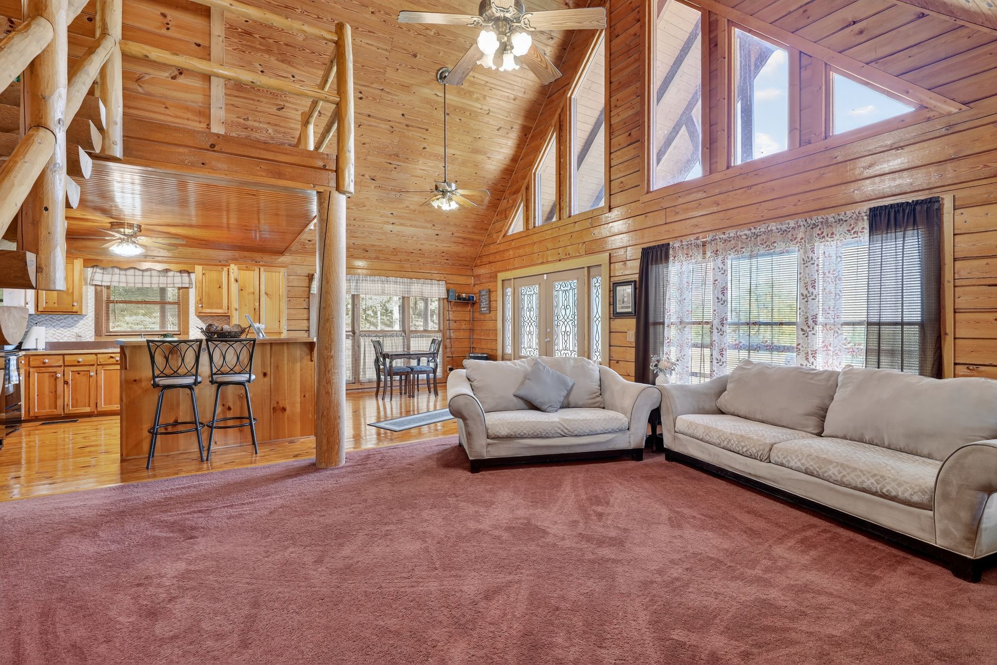 1794 Roberts Road Watertown, TN 37184 - Photo 25 of 38 a living room with furniture and a floor to ceiling window