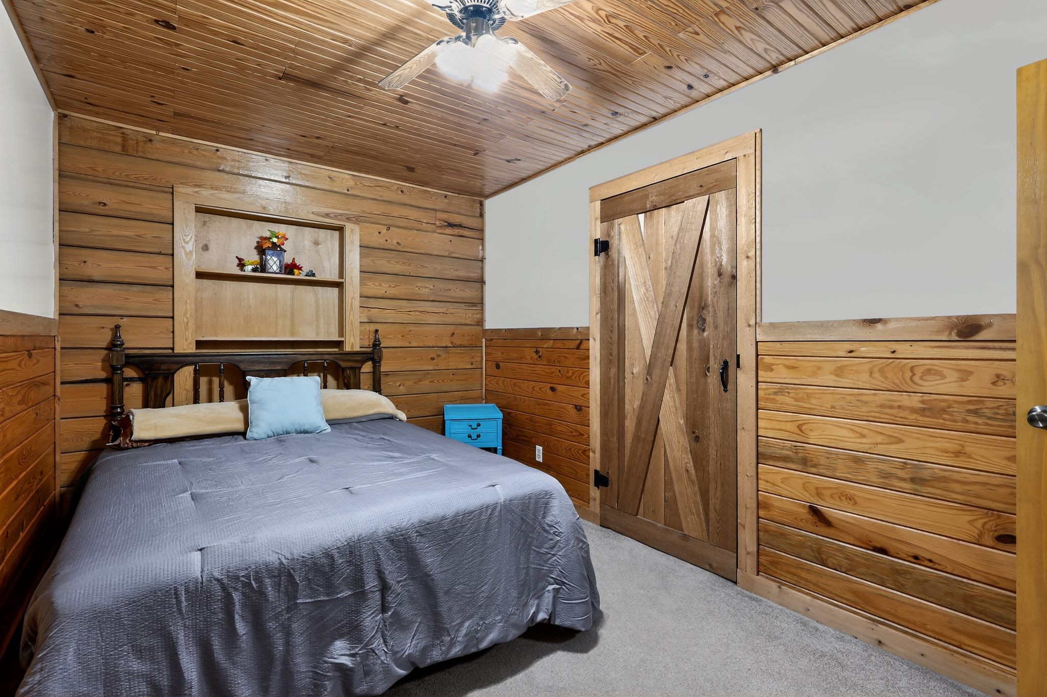 1794 Roberts Road Watertown, TN 37184 - Photo 34 of 38 a bedroom with a bed and a walk in closet