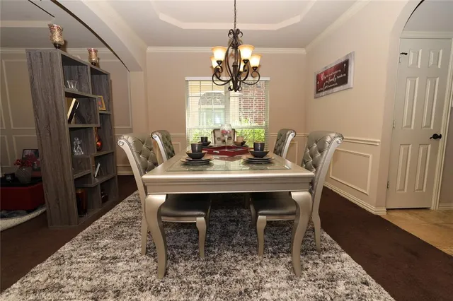a living room with furniture rug and window