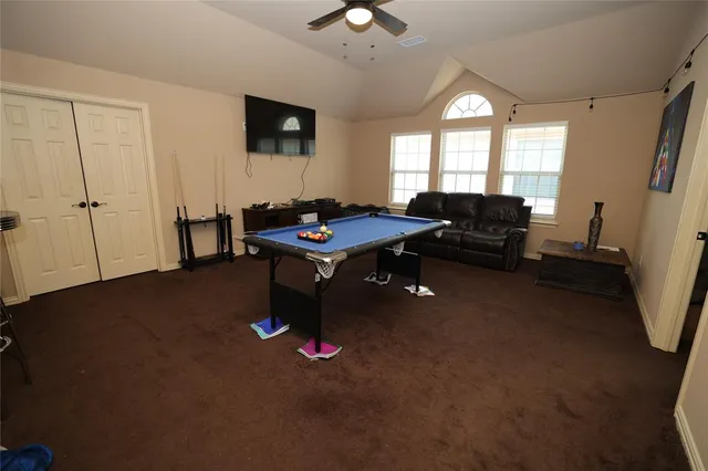 a room with a wooden floor and a chair