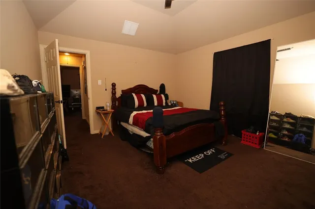 a balcony with furniture and a potted plant