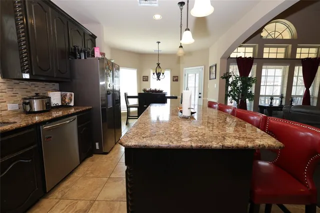 a view of a livingroom with furniture and window