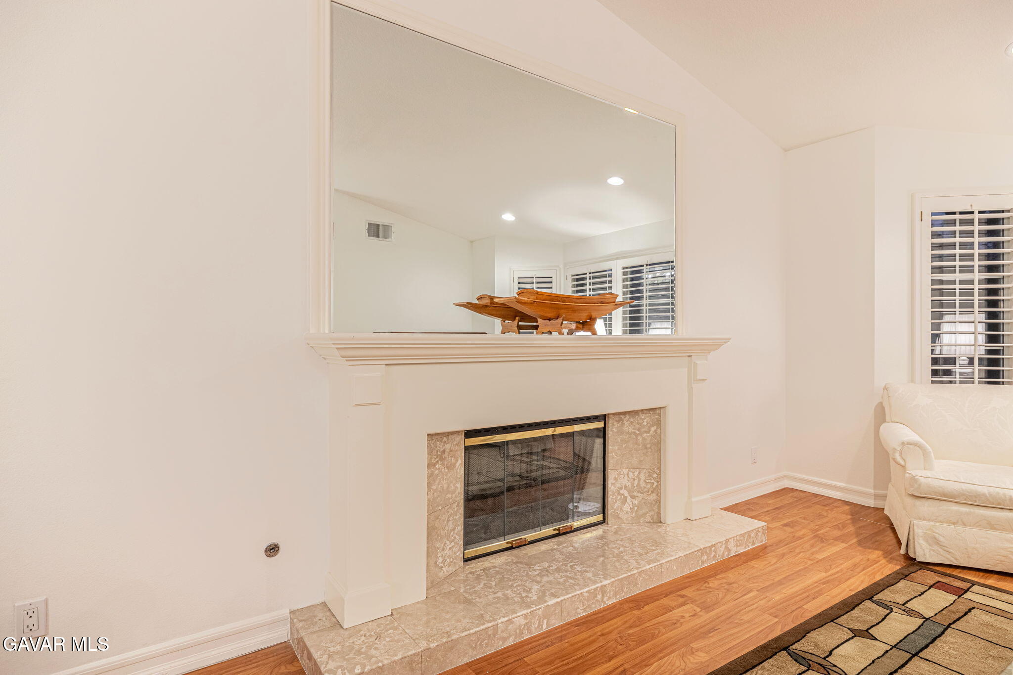 19809 Winged Foot Way Porter Ranch, CA 91326 - Photo 14 of 70 a living room with furniture and a fireplace