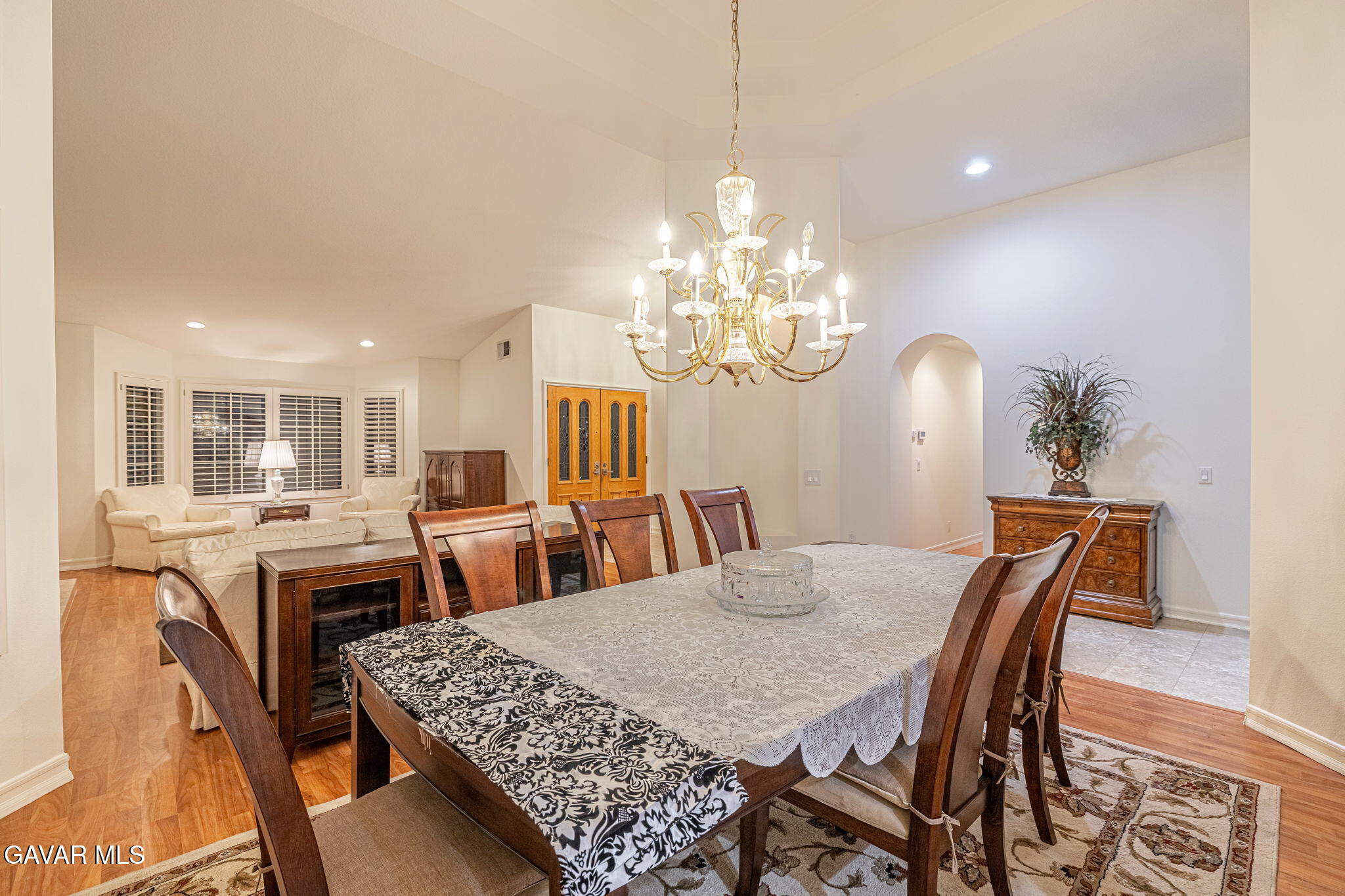 19809 Winged Foot Way Porter Ranch, CA 91326 - Photo 16 of 70 a view of a dining room with furniture wooden floor and chandelier