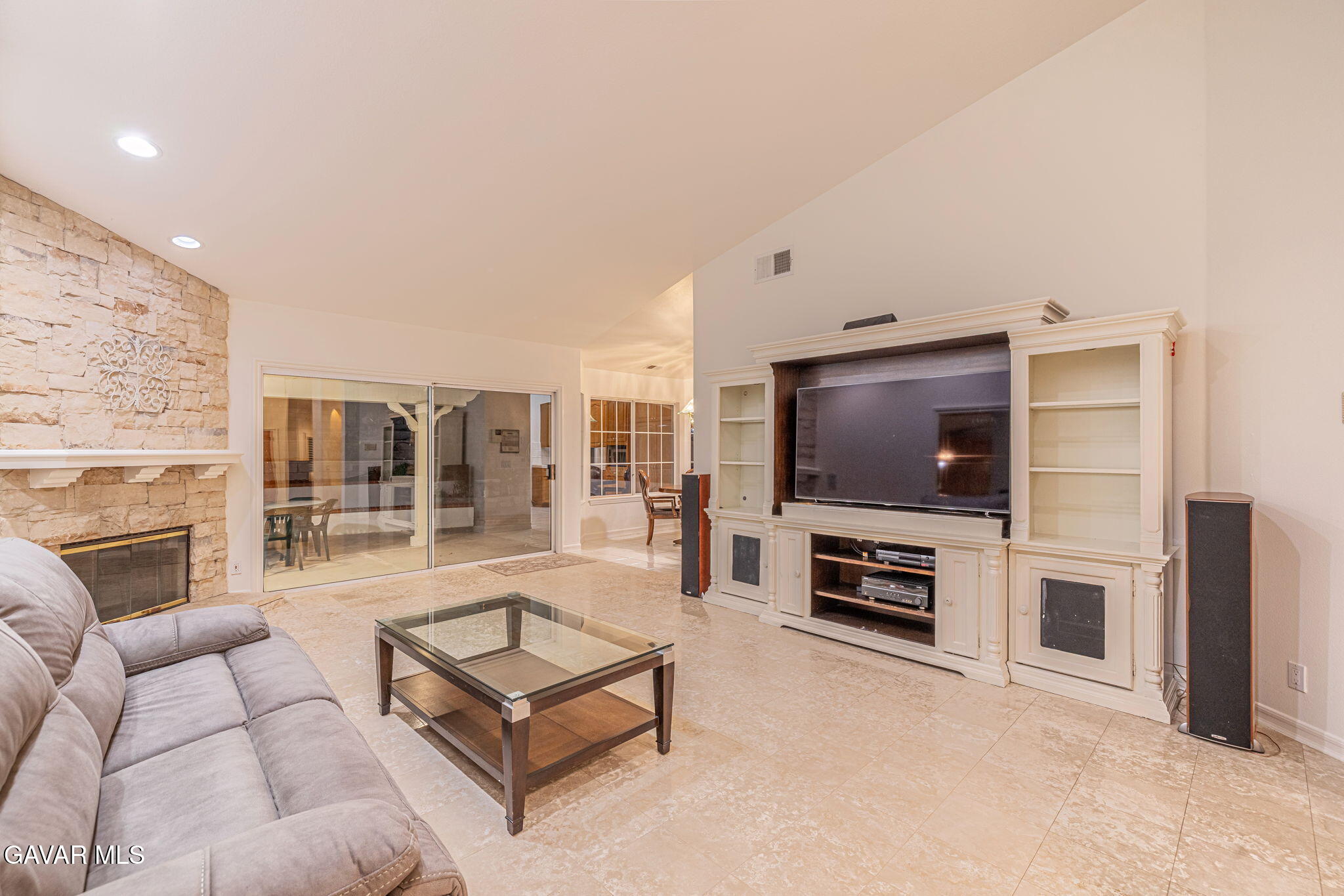 19809 Winged Foot Way Porter Ranch, CA 91326 - Photo 17 of 70 a living room with furniture and a flat screen tv