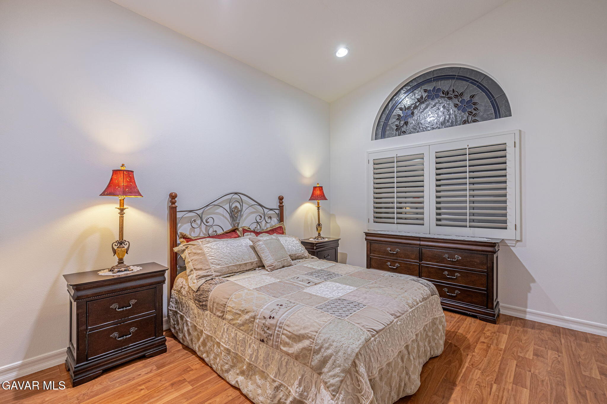 19809 Winged Foot Way Porter Ranch, CA 91326 - Photo 28 of 70 a bedroom with a bed and a dresser