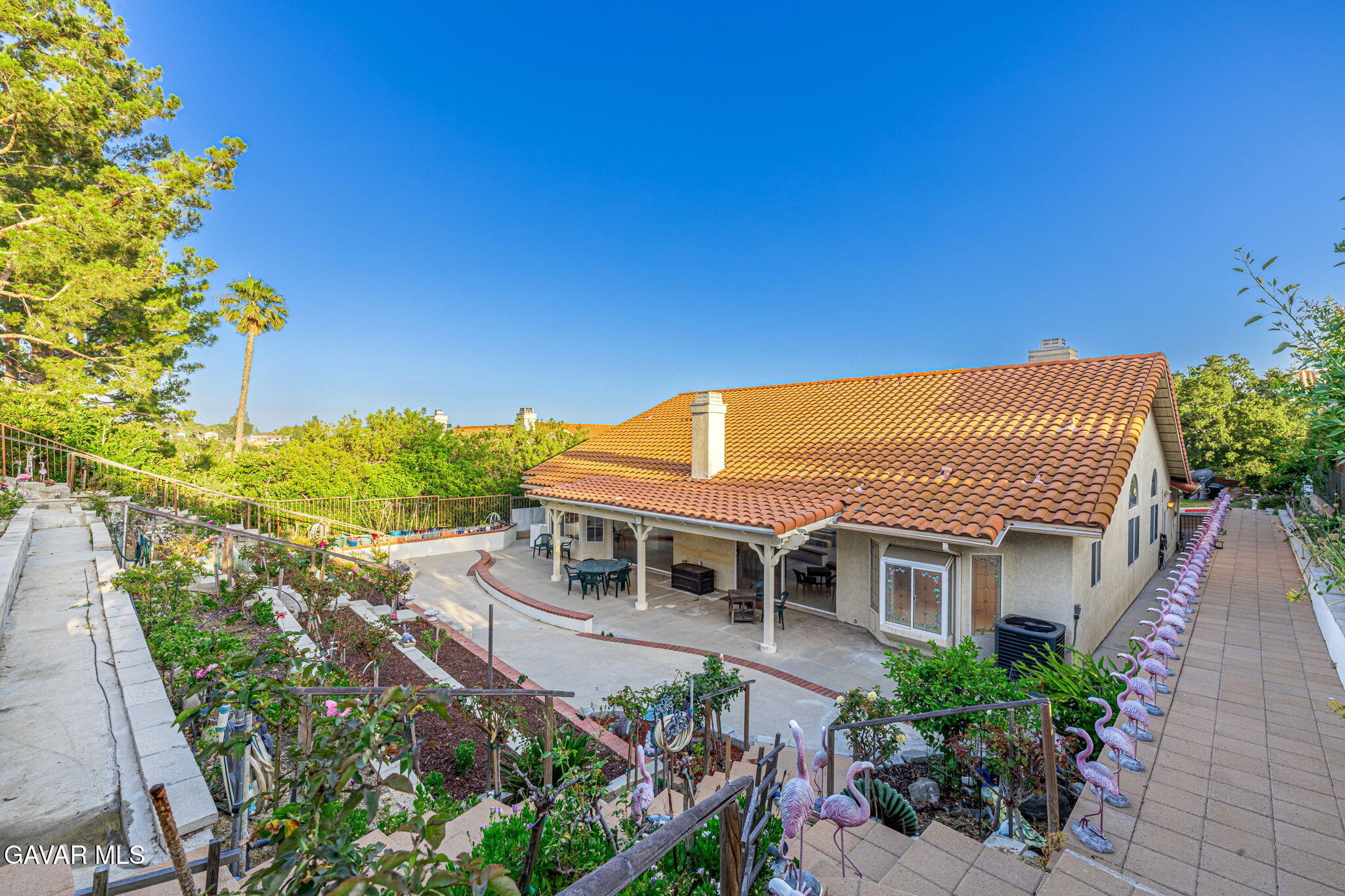 19809 Winged Foot Way Porter Ranch, CA 91326 - Photo 43 of 70 a front view of a house with a yard