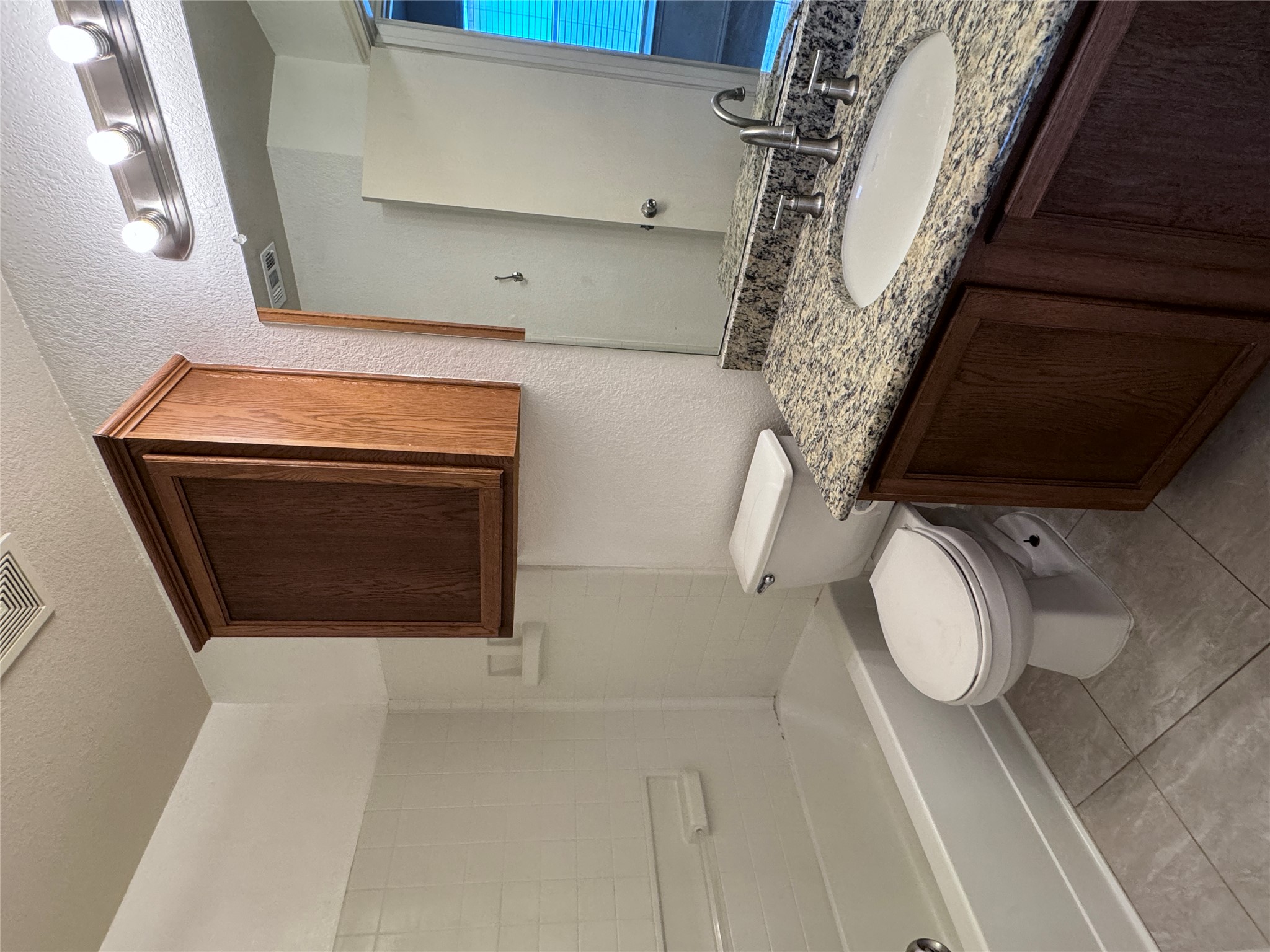 3411 Wickham Lane Austin, TX 78725 - Photo 13 of 20 Full secondary bathroom