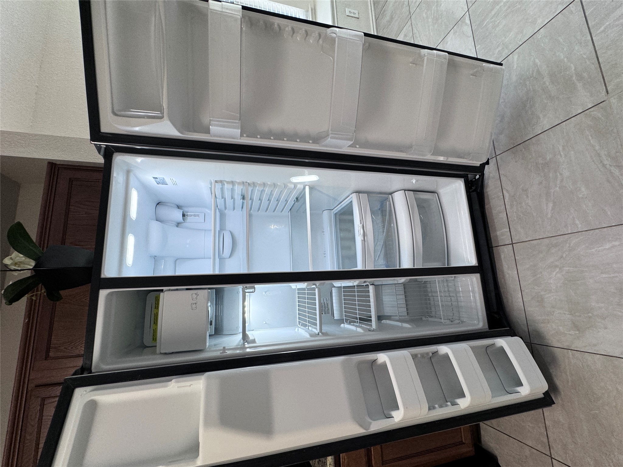 3411 Wickham Lane Austin, TX 78725 - Photo 15 of 20 Refrigerator with ice maker and water dispenser.