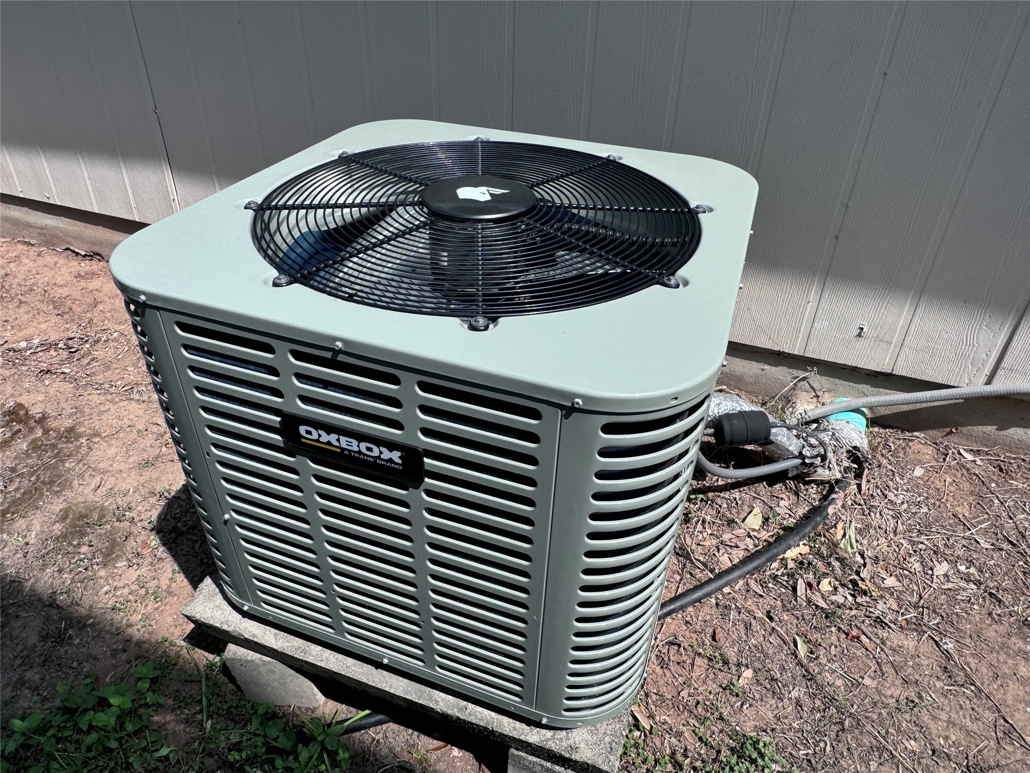 3411 Wickham Lane Austin, TX 78725 - Photo 19 of 20 Exterior view of a recently installed central air condition unit