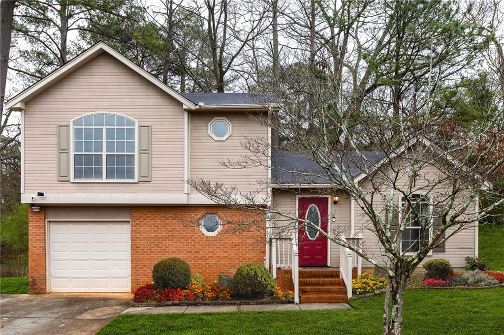 2373 Deep Shoals Circle Decatur, GA 30034 - Photo 1 of 1 a front view of a house with garden