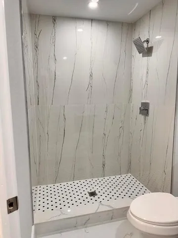 a bathroom with a sink and a toilet