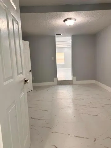 a view of a room with a window