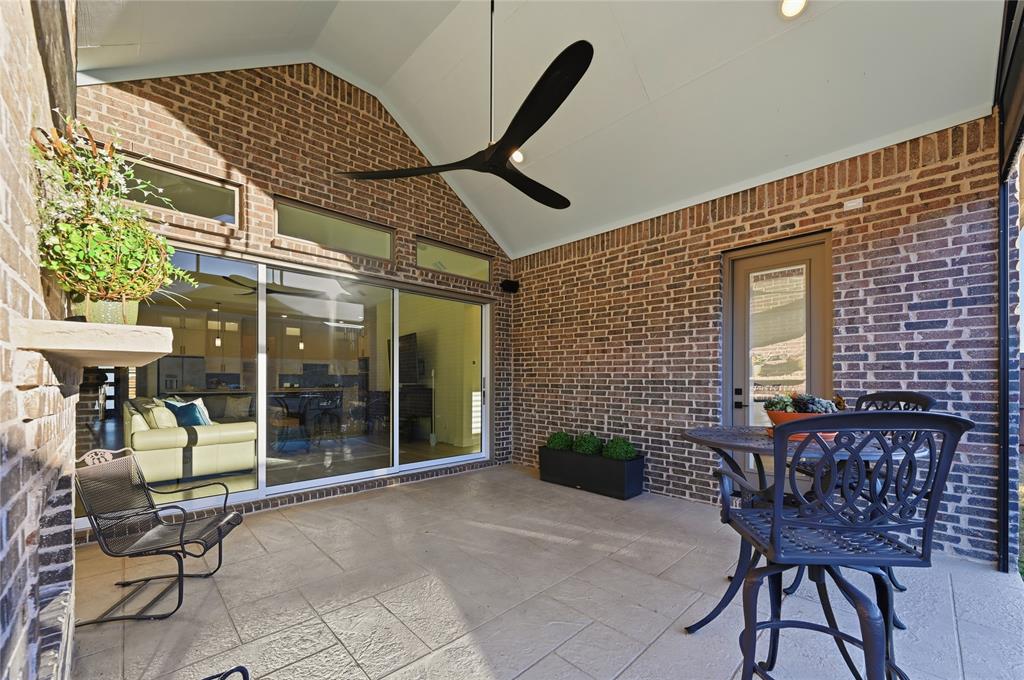 4409 Lk Vw Road Oak Point, TX 75068 - Photo 24 of 40 a patio with table and chairs